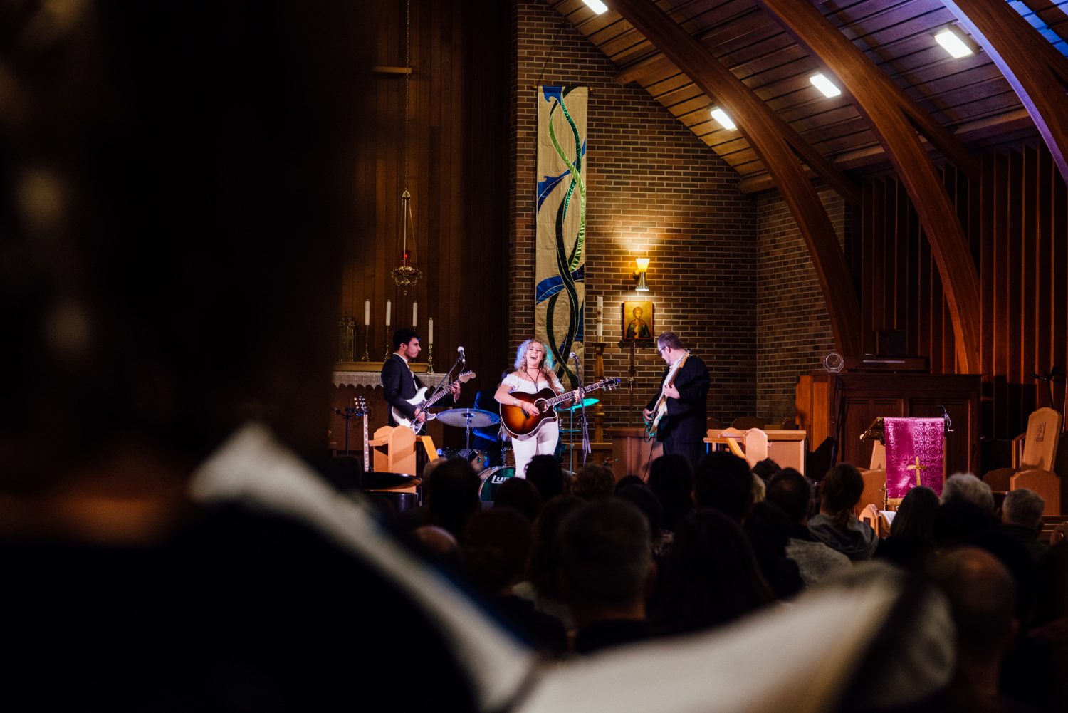 Maddie Storvold & the Moonlighters performs with choirs Bella Voce and ChandraTala at Songs in the Sanctuary 2020. Photo by BB Collective.