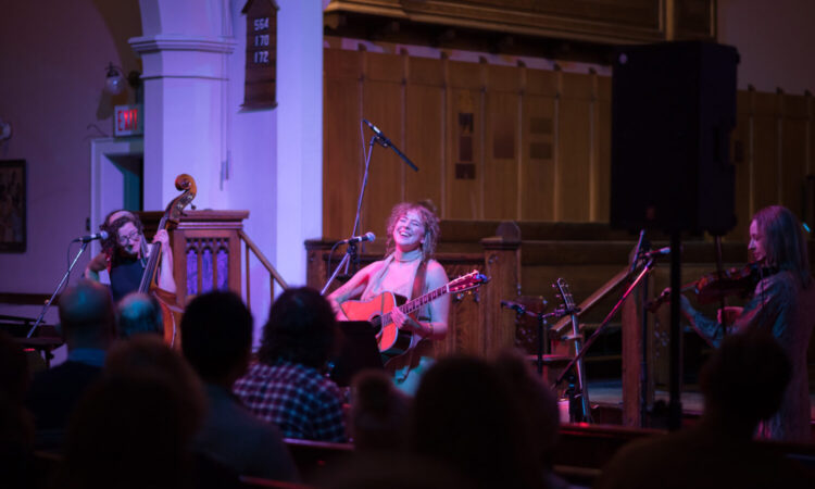Songs in the Sanctuary featuring Maddie Storvold. SkirtsAfire 2023. Photo by April MacDonald Killins.
